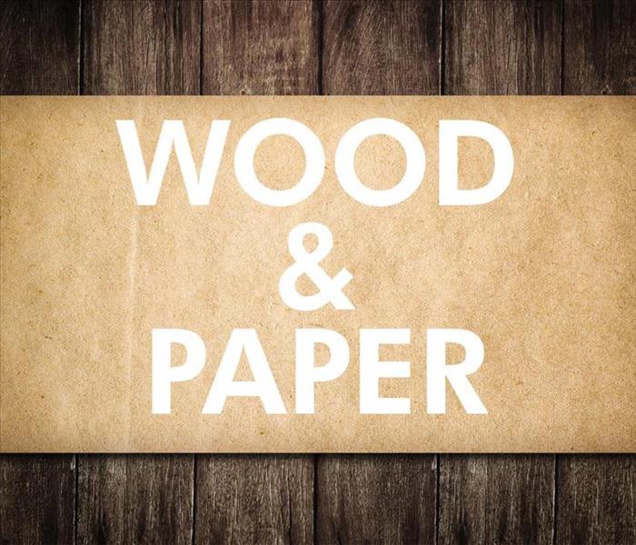 Craft paper with words on the top that say WOOD AND PAPER