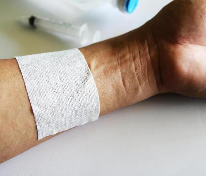 an arm with a bandage on it